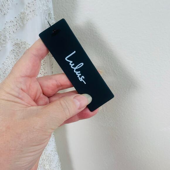 Lulu's White V-Neck Jumpsuit - Picture 12 of 13